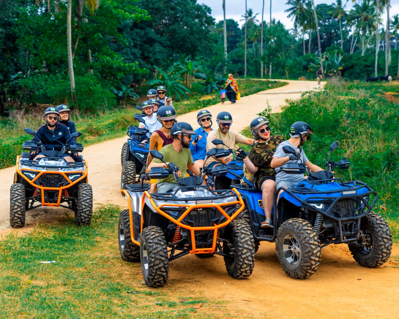 Group enjoying quad bike village adventure with professional guides in Zanzibar