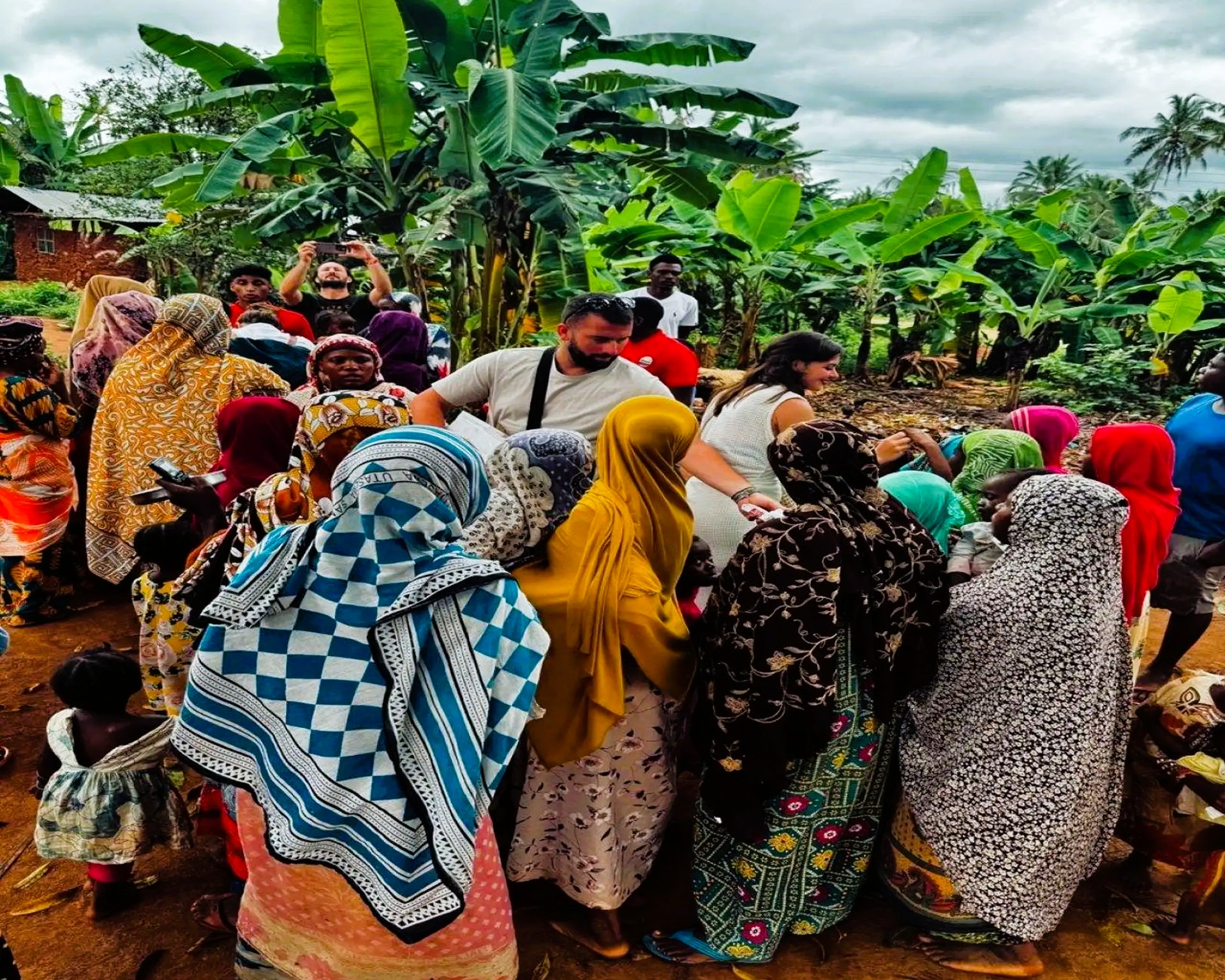 Authentic traditional Swahili lunch prepared by local women in Zanzibar village